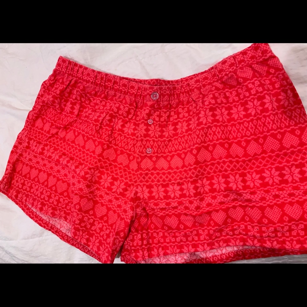 Cute red pajama shorts with sparkly buttons